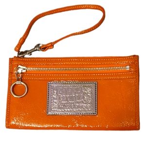 EUC Coach Poppy Patent Leather Orange Wristlet